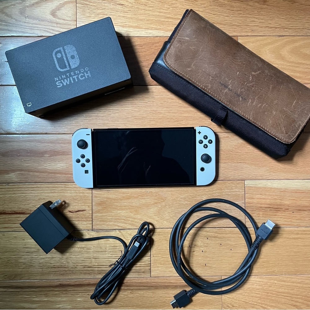 Nintendo Switch Console with White Joy-Con